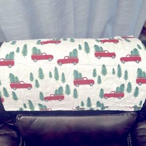 Set of twin flannel sheets with cute Christmas truck themed very soft and comfy!